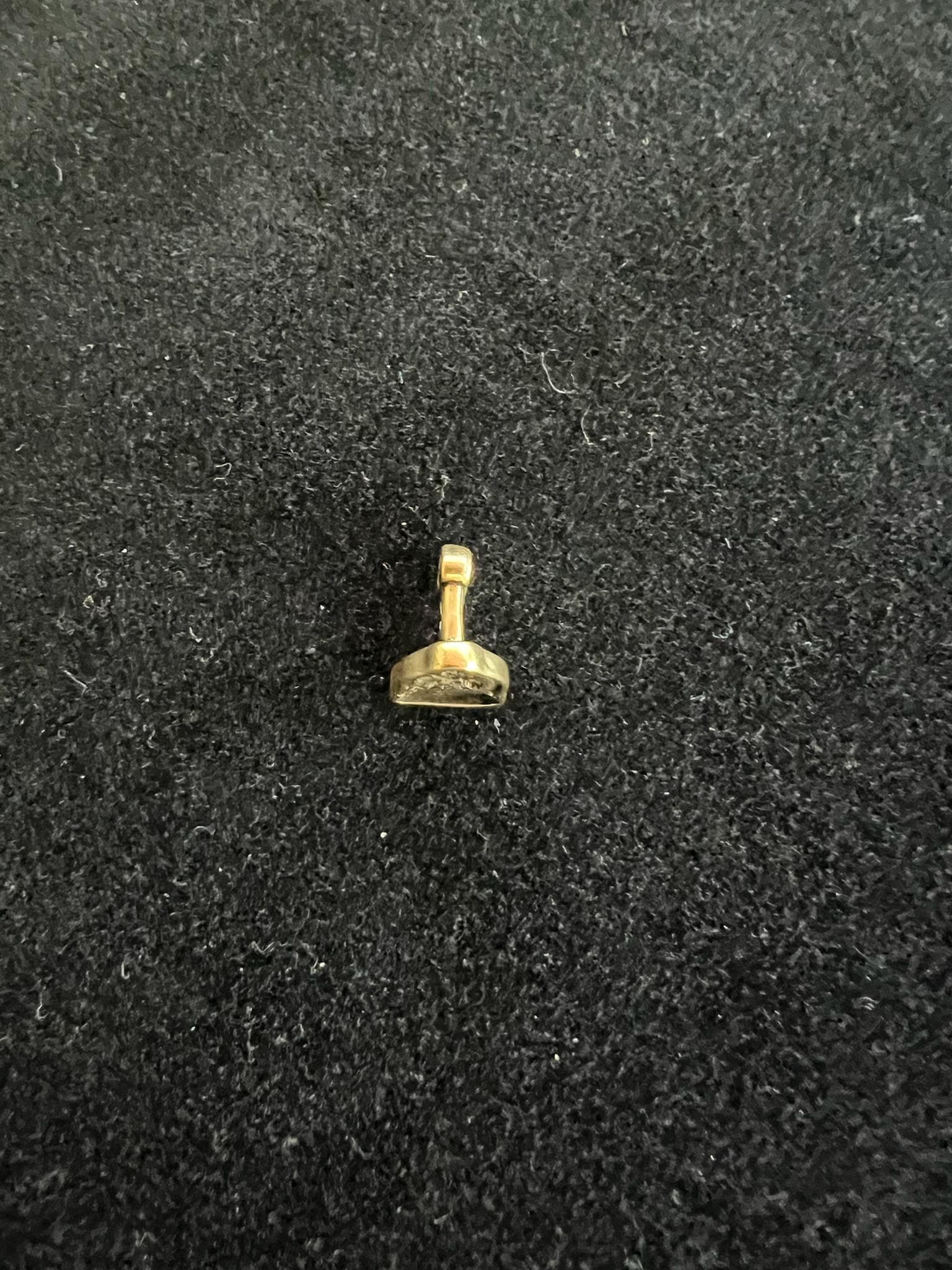 Tiny Buddha Tsa Tsa Charm | Metal | Approx 3/8in x 1/4in | Tibet | Mala Counter - The Incense Stick