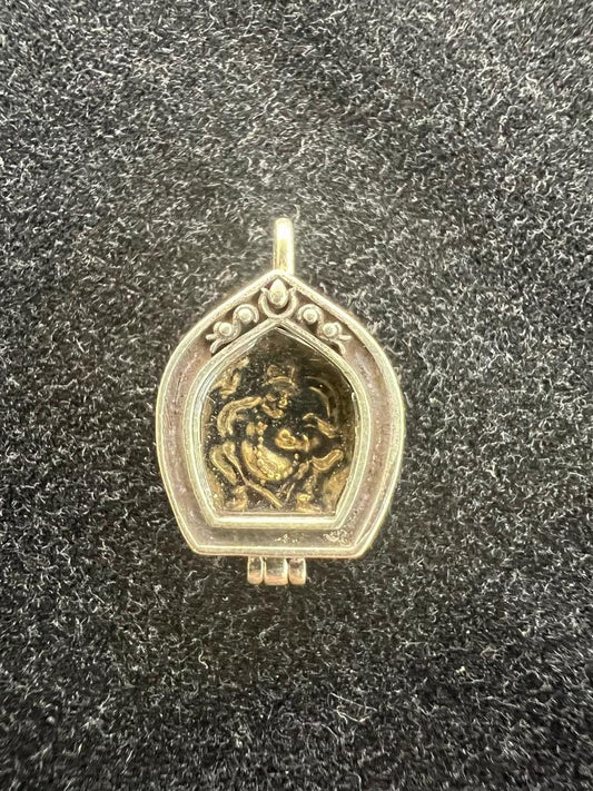 Tiny Dzambhala Ghau Pendant | Metal and Glass | Approx 3/4in x 1/2in | Tibet | Gau - The Incense Stick