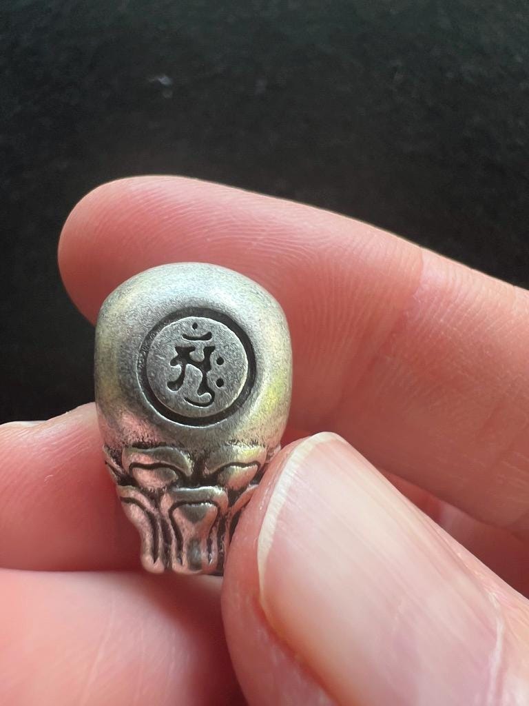 Buddha Guru Bead | Metal | Approx 3/4 inches Long by 1/2 inches Wide | Tibet - The Incense Stick