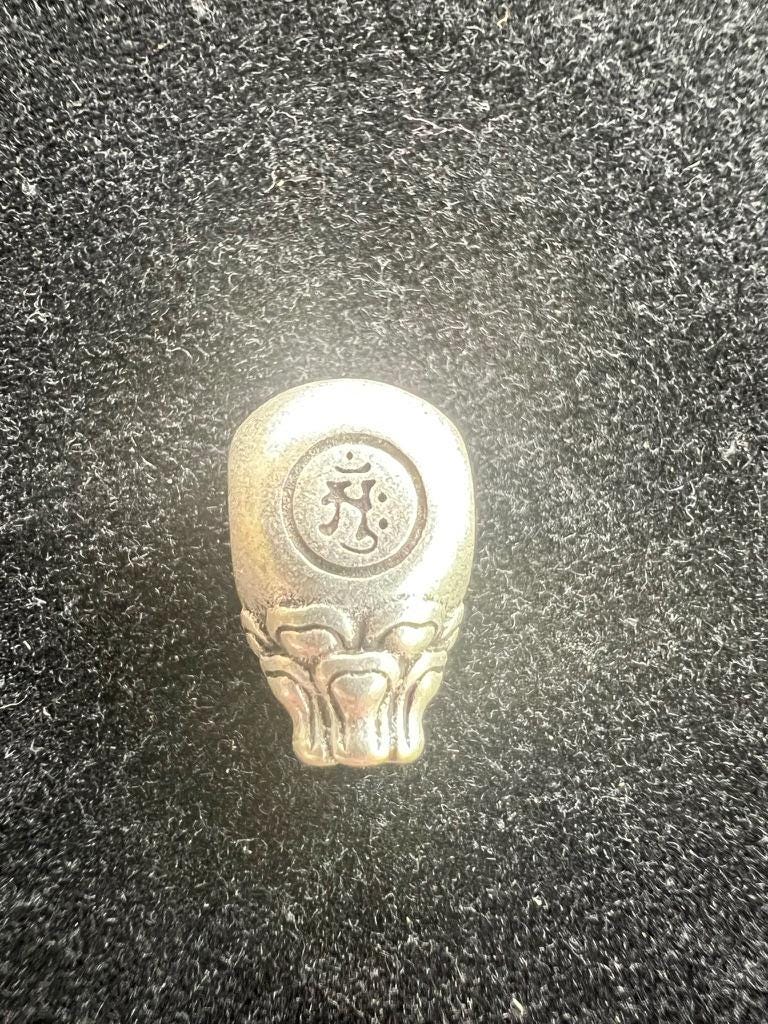 Buddha Guru Bead | Metal | Approx 3/4 inches Long by 1/2 inches Wide | Tibet - The Incense Stick