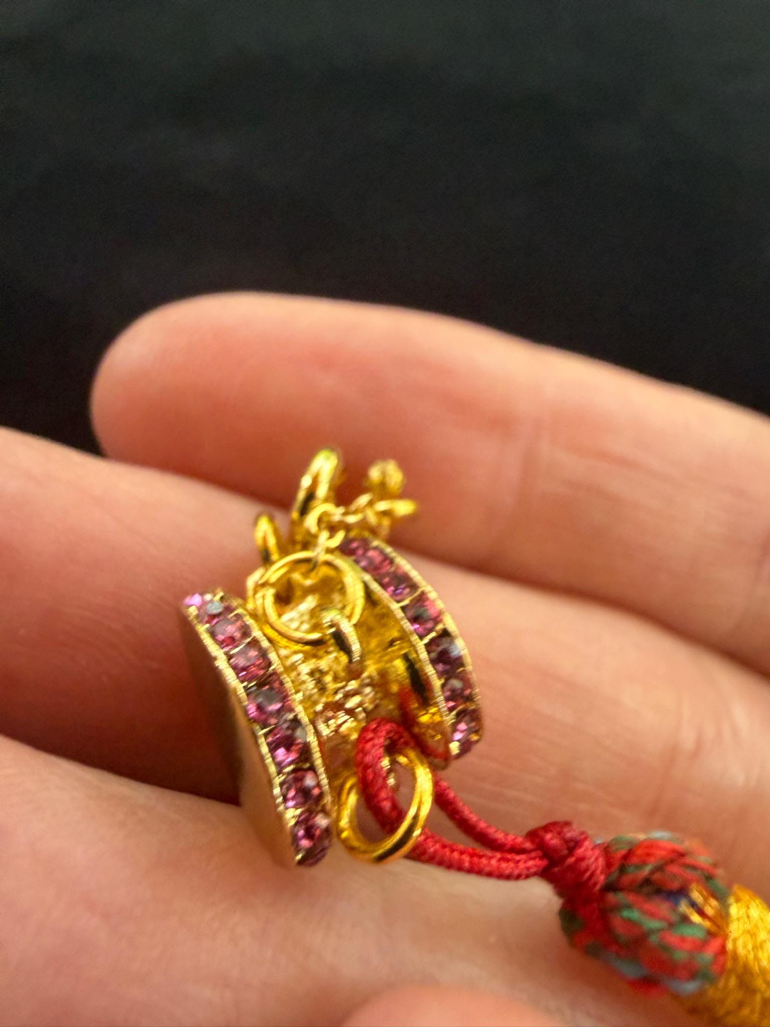 Damaru Pendant | Metal, Rhinestones | Approx 3/8in x 1/2in | Tibet | Tibetan Drum