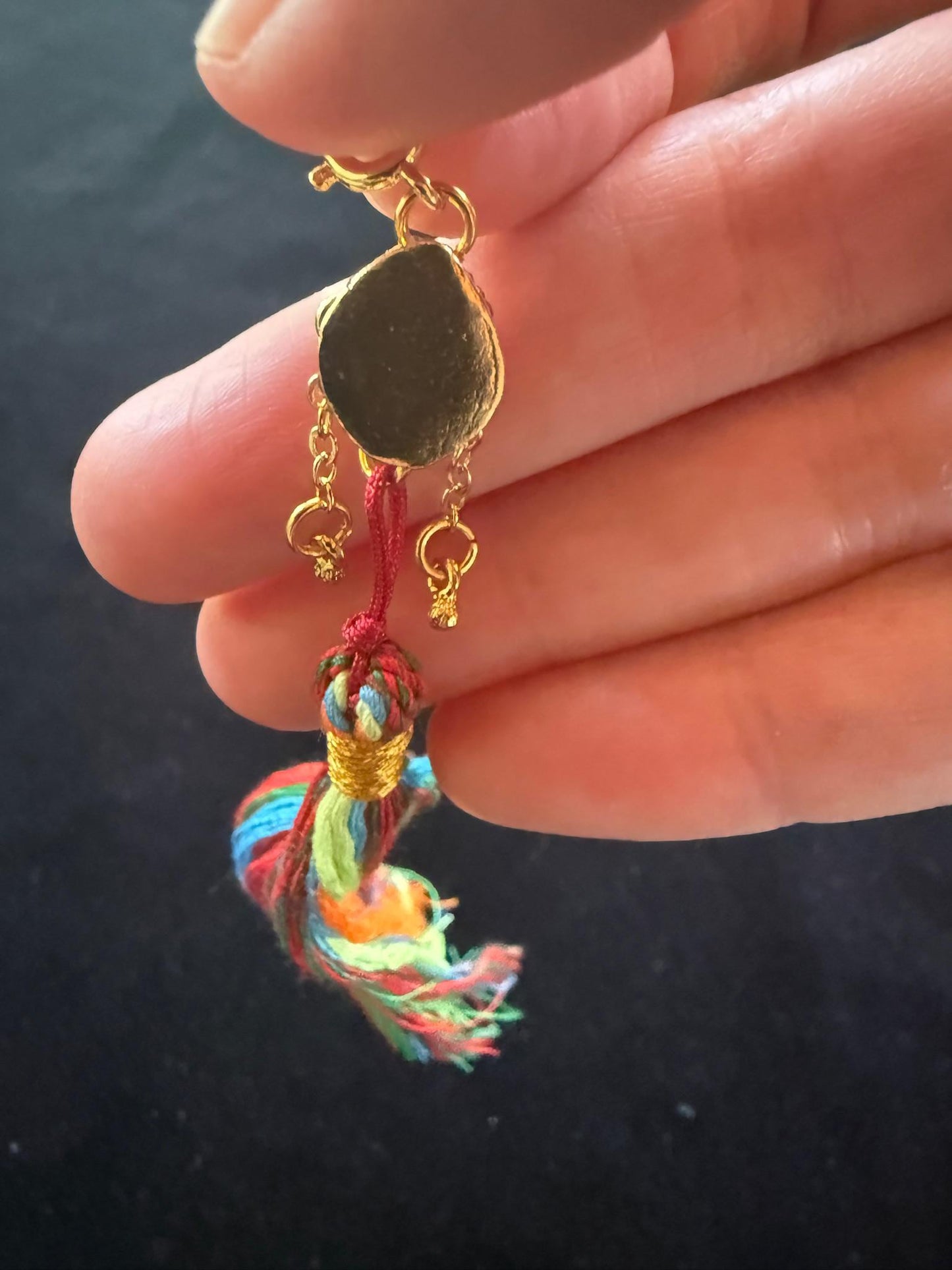 Damaru Pendant | Metal, Rhinestones | Approx 3/8in x 1/2in | Tibet | Tibetan Drum